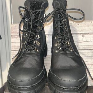 Steve Madden Black Combat Boots with Lace-Up Design and Thick Rubber Sole